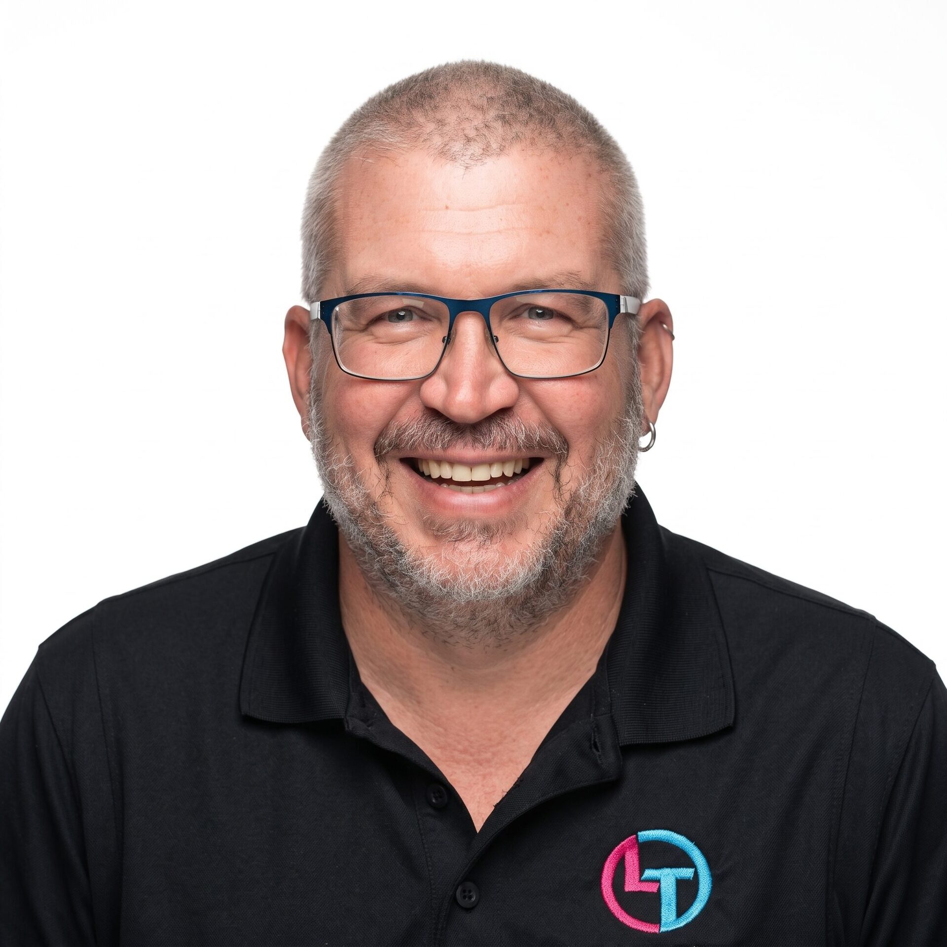 Portrait of an ABC Networks co-founder, a man wearing glasses.